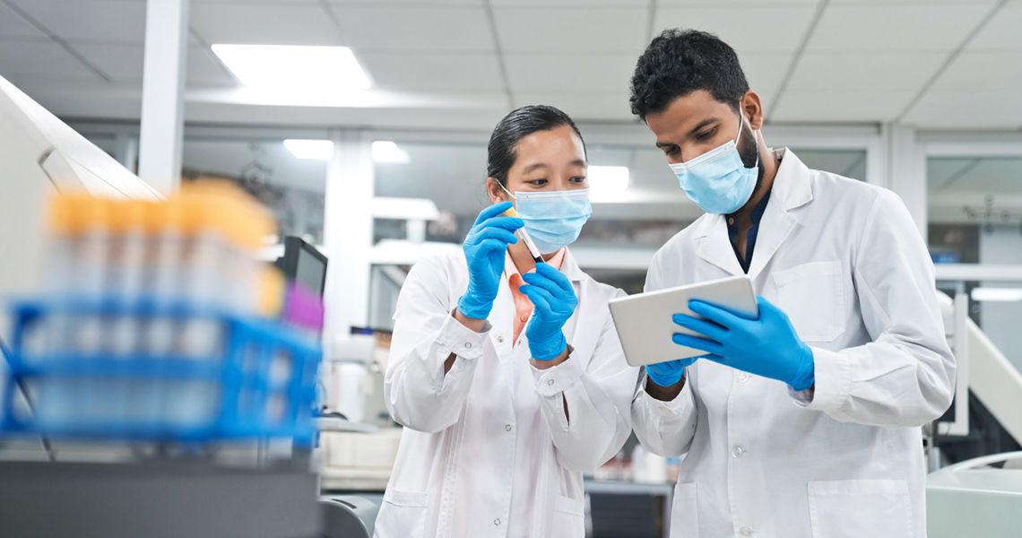 Biomedical Laboratory Scientists reviewing lab tests
