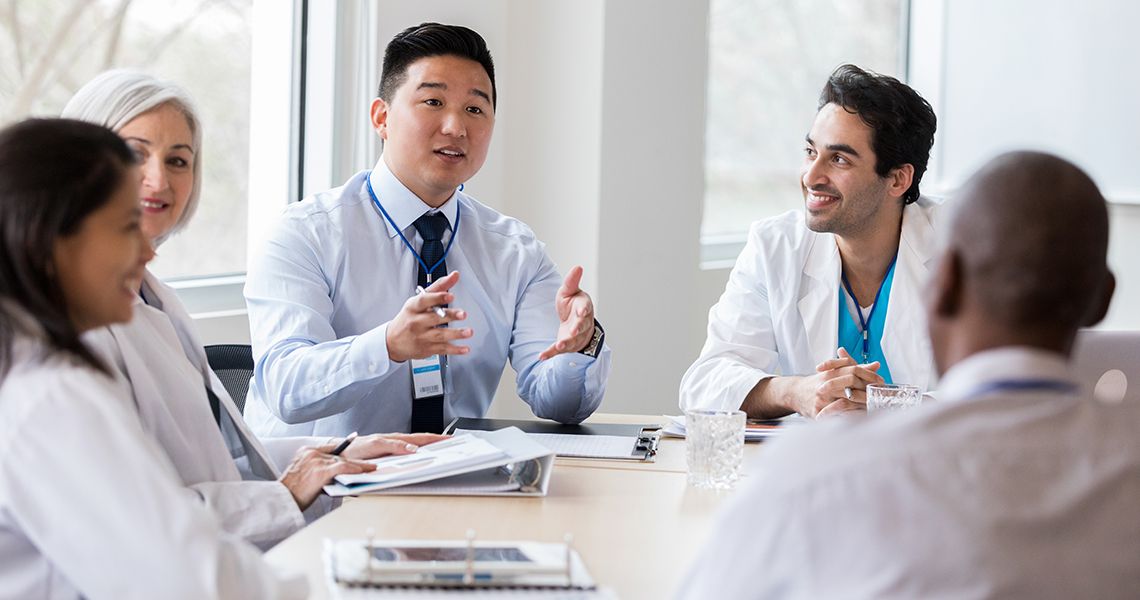 Business people and doctors in a meeting