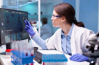 A Medical biochemist is developing a new technology for discovering a vaccine. The doctor and her team analyse virus industry, working with professional technology for medicine industry.